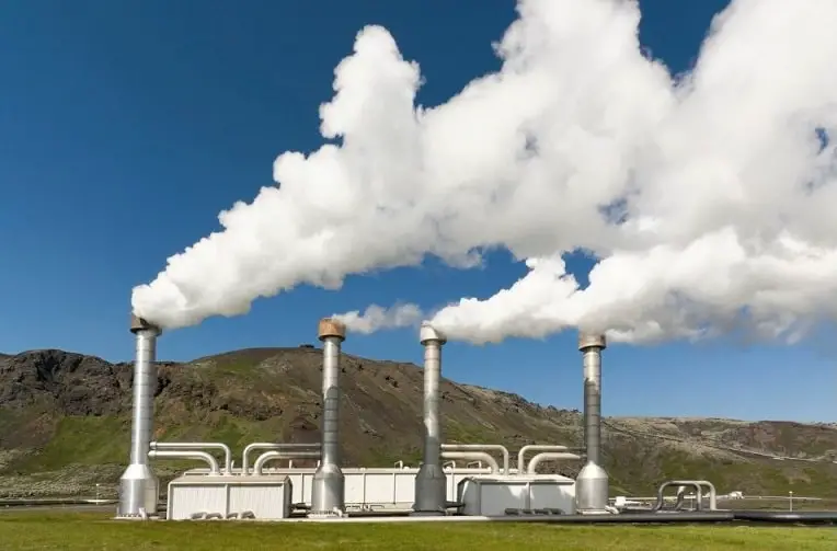 steel chimneys with smoke from geothermal energy